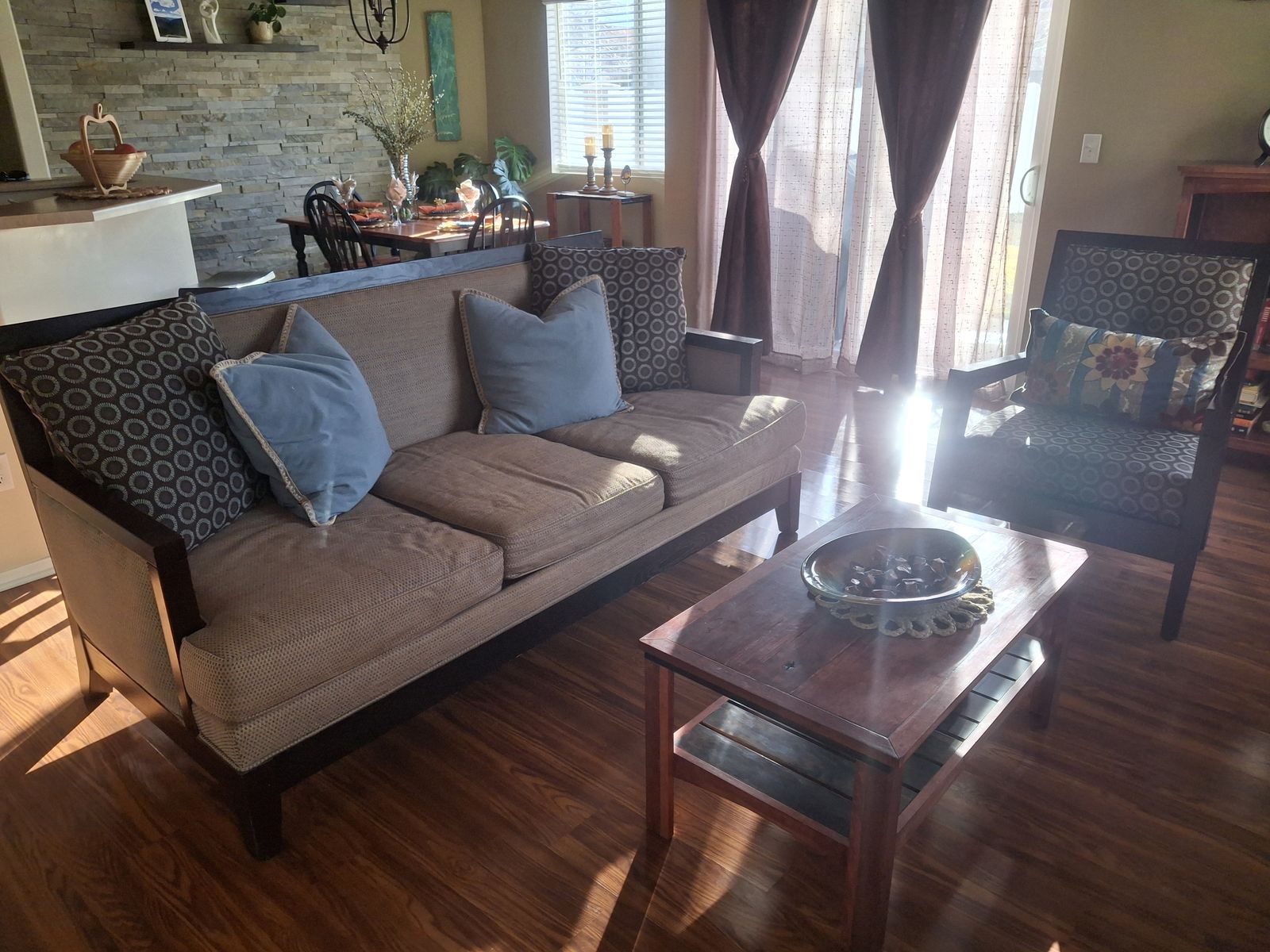 Couch with throw pillows and with matching chair