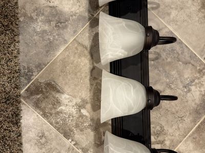 4-Light Oil Rubbed Bronze Bathroom Vanity Light Fixture with Alabaster Glass Shades