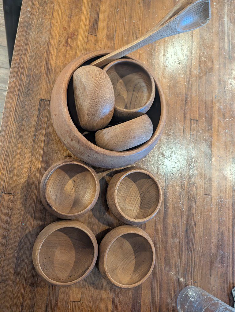teak wood bowls and two utensils