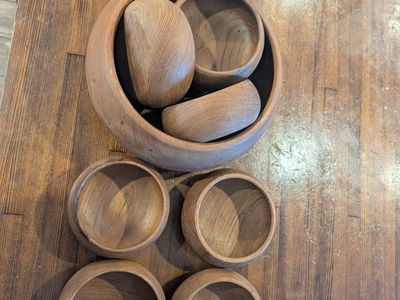 teak wood bowls and two utensils