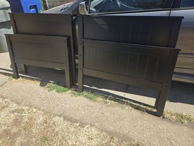set of 2 new black twin head boards and foot boards