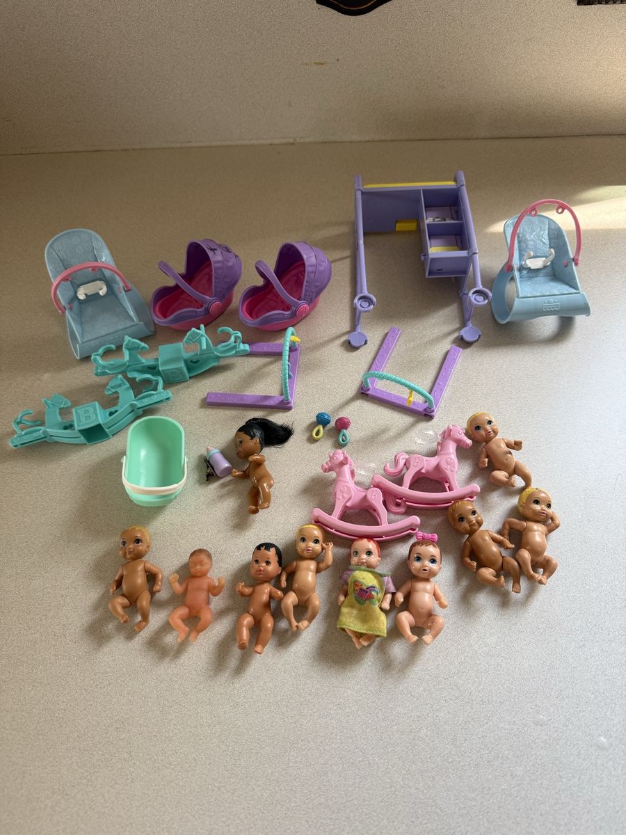 barbie baby doll collection a couple have marker as shown.
