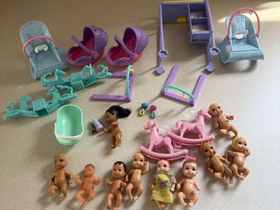 barbie baby doll collection a couple have marker as shown.