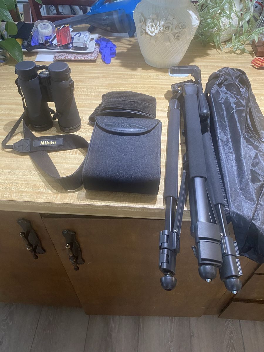 Nikon Pro-staff binoculars, tripod, binoculars mount for tripod. Like new condition.
