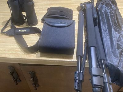 Nikon Pro-staff binoculars, tripod, binoculars mount for tripod. Like new condition.