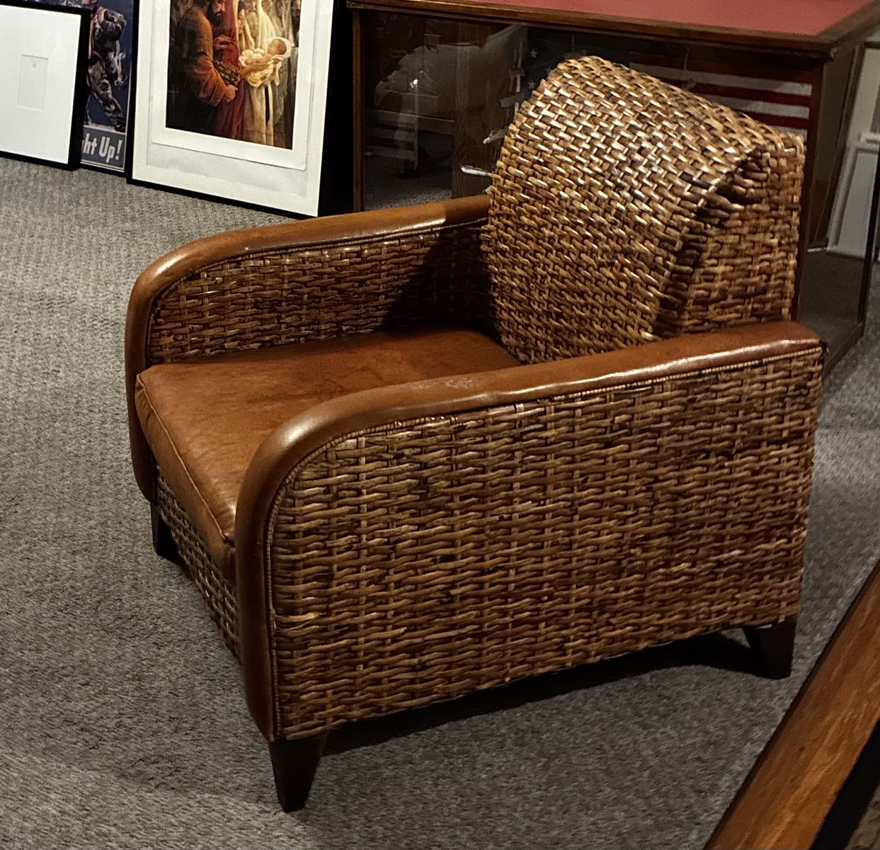 2 Wicker and Brown Leather Armchairs