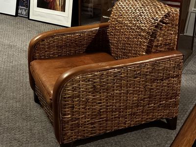 2 Wicker and Brown Leather Armchairs