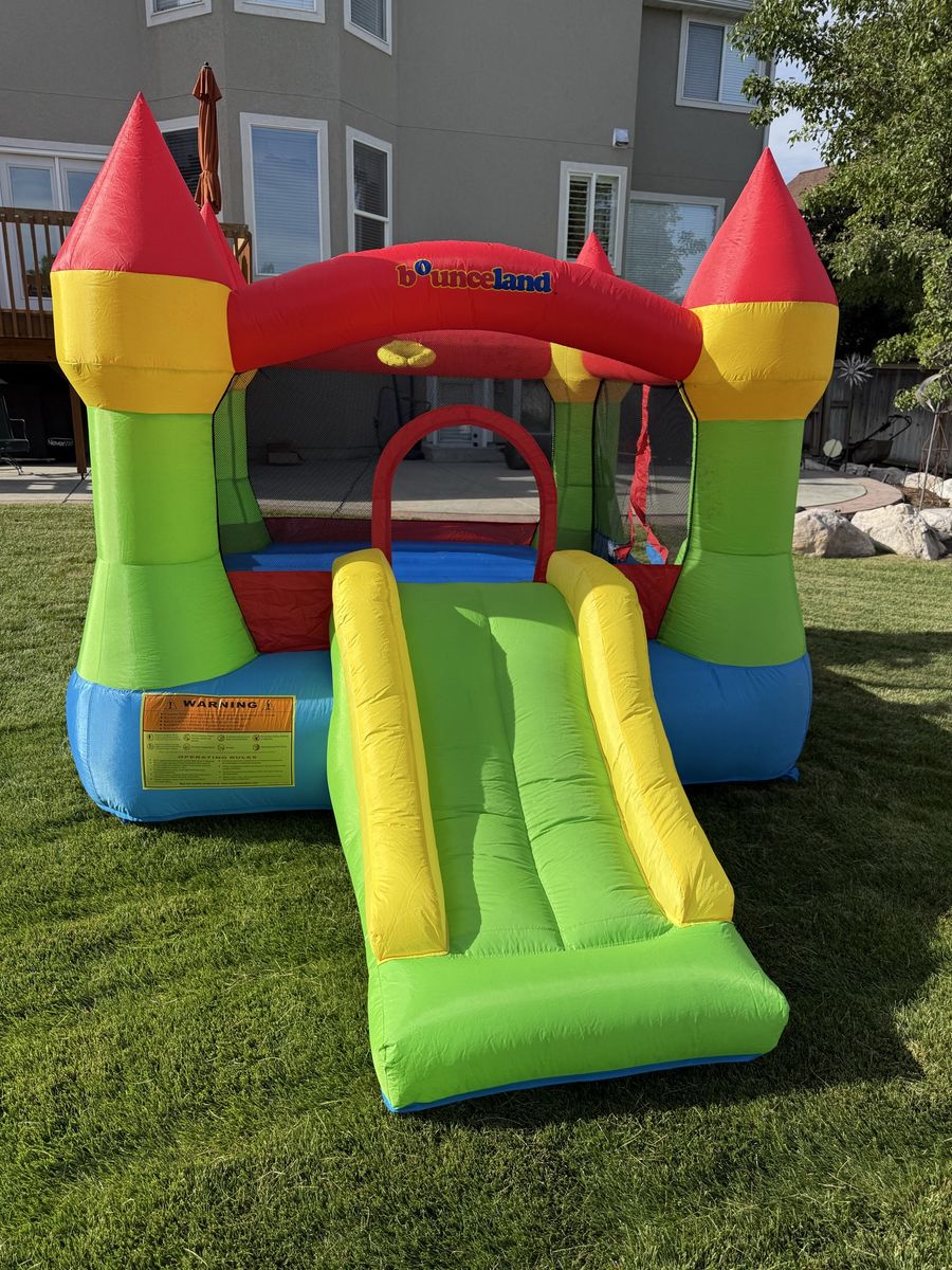 Bounceland Inflatable Bounce House with Slide Castle Theme
