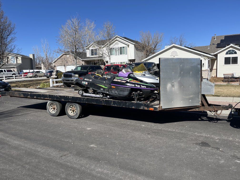 Snowmobiles and Trailer