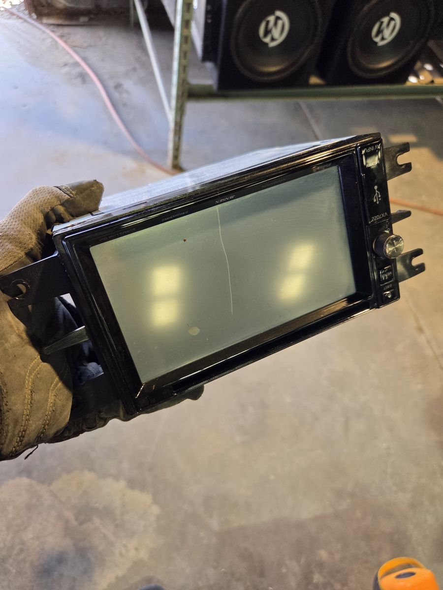 Jensen radio works great has a scratch on the screen