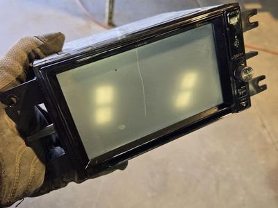 Jensen radio works great has a scratch on the screen