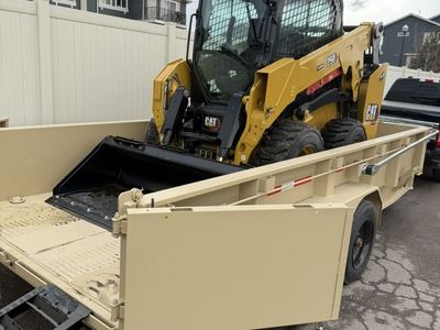 Skid Steer + Dump Trailer Rental. New Cat 250 Wheel Skid Combo