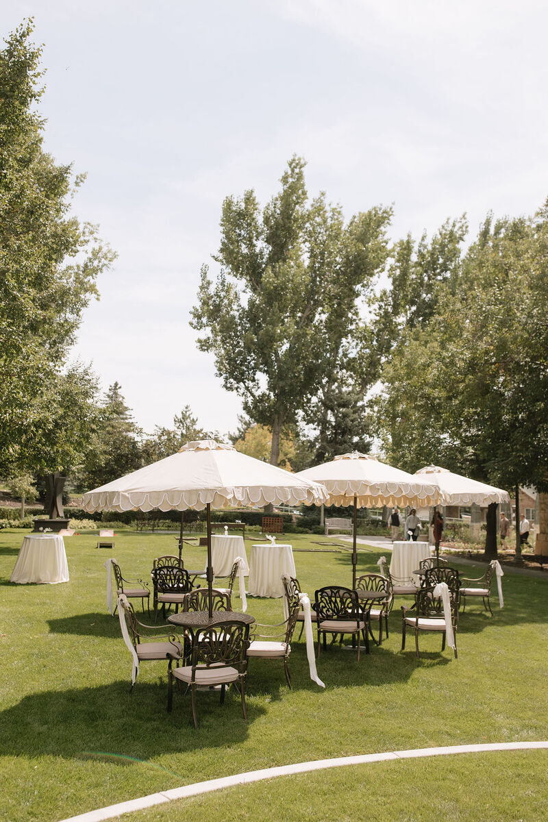 Beige and cream scalloped outdoot patio umbrellas
