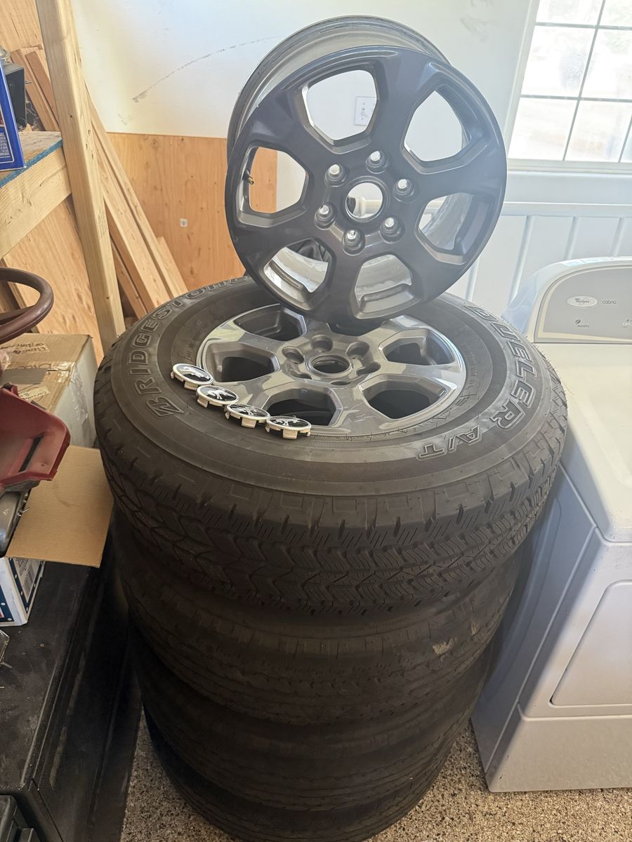 5 Ford Bronco Rims and caps and 4 tires