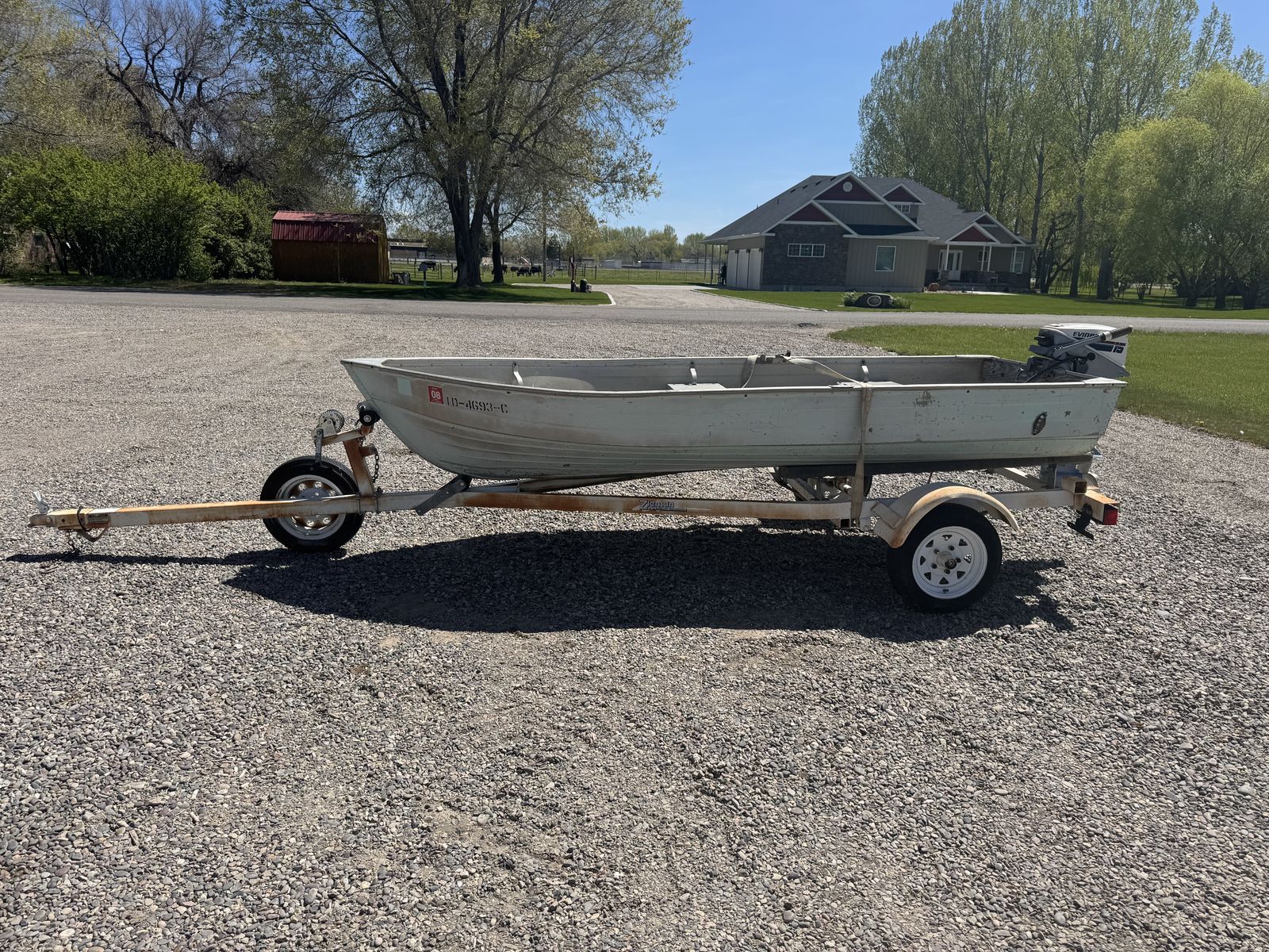 Boat, trolling motor, trailer