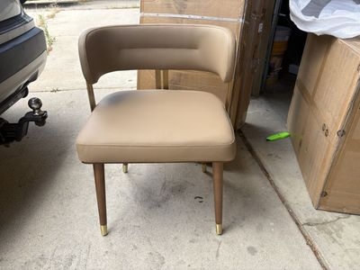 Modern Tan Faux Leather Dining Chair with Wood Back and Brass Accents