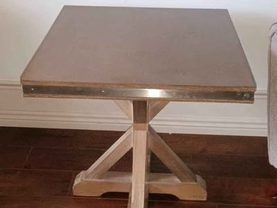 Wooden End Table with Metal Trim and Trestle Base