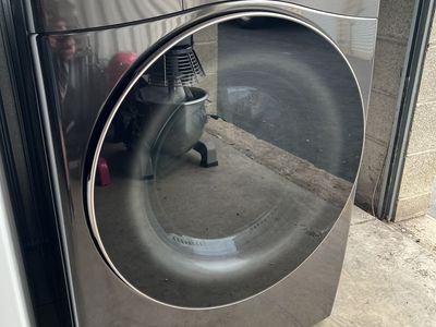 LG Vented SMART Stackable Electric Dryer in Black Steel with TurboSteam and Sensor Dry Technology
