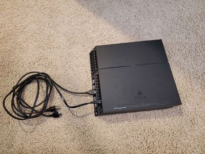 Play Station 4 with headset and 5 games