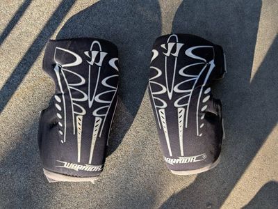 Used Warrior BLK/WHT AP Lacrosse Arm Pads/Guards - Adult Large, Black/White