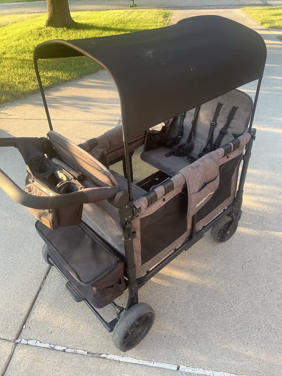WonderFold W4 Quad Stroller Wagon with Canopy and Storage