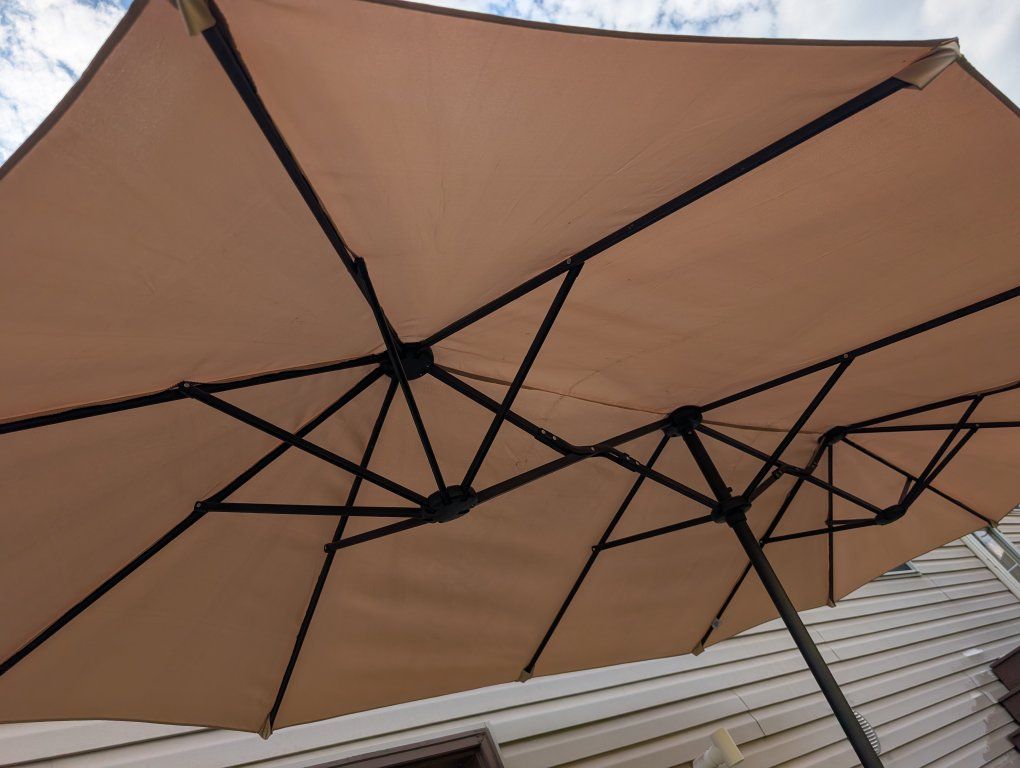 Large Tan Outdoor Patio Umbrella with Crank Mechanism