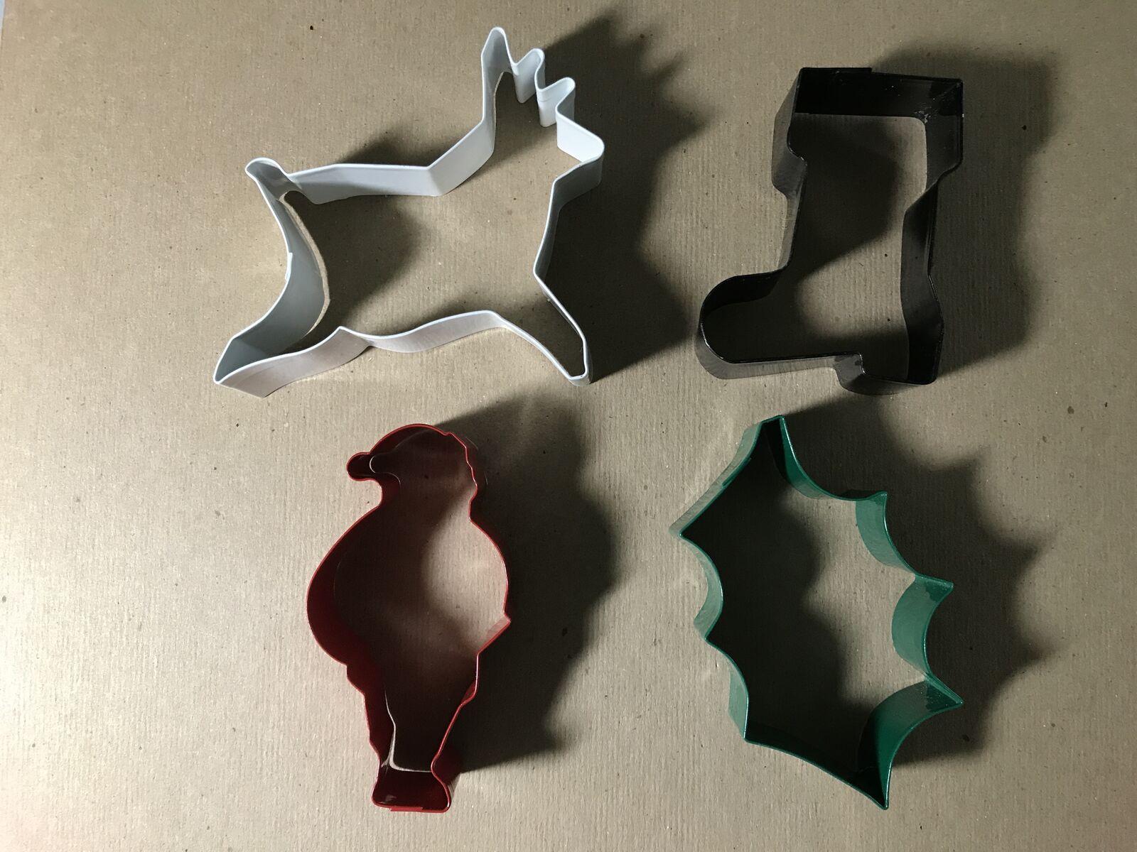 Wilton 4 Enamel Painted Cookie Cutters Santa, Deer, Boot and Holly Leaf