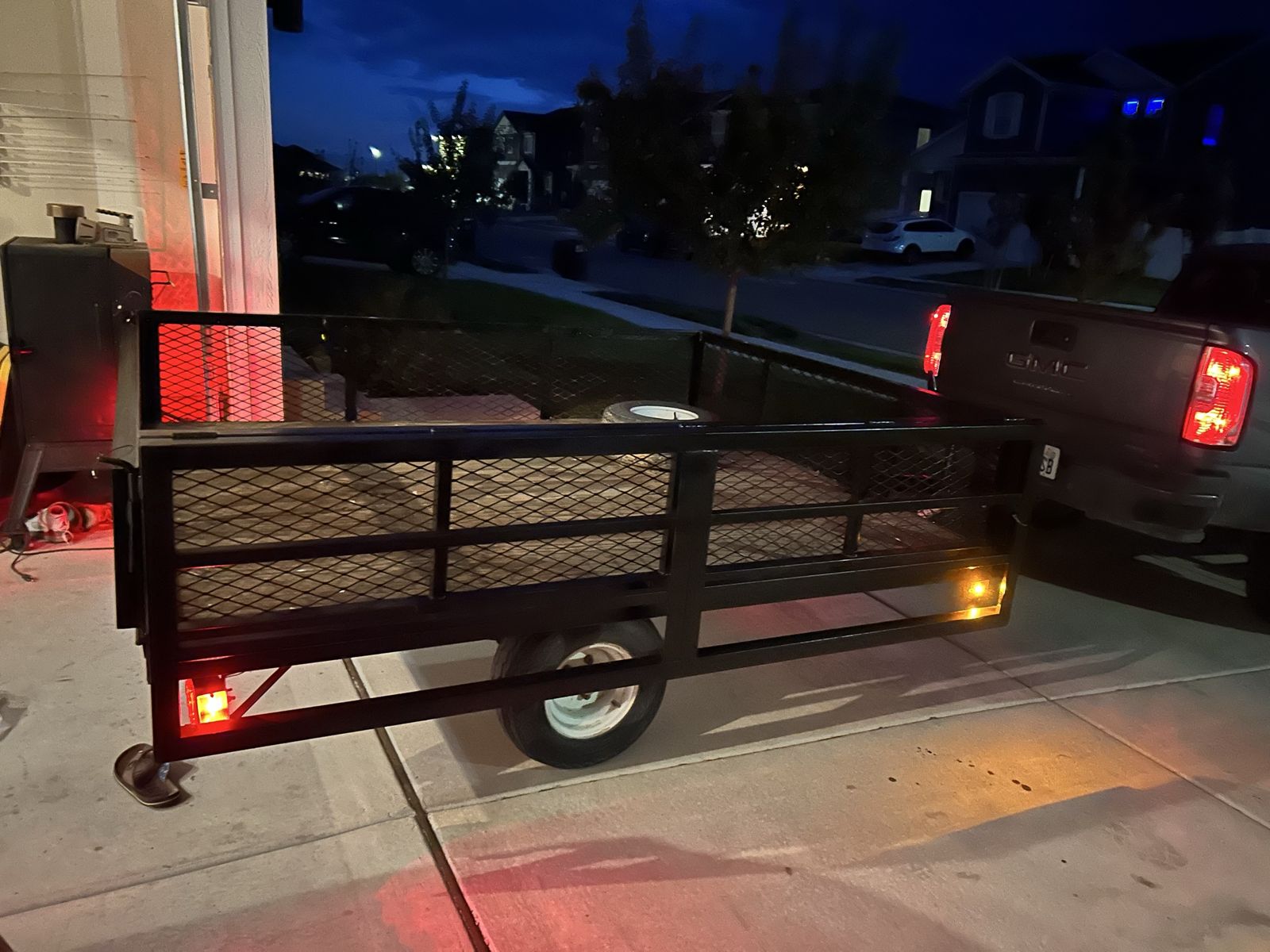 Mitee Lite Utility Trailer with side Ramp Gate and Spare Tire