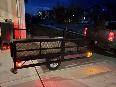 Mitee Lite Utility Trailer with side Ramp Gate and Spare Tire