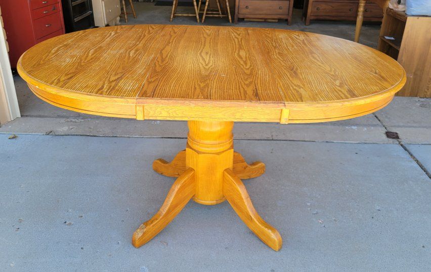 Oak Finish Oval Pedestal Dining Table with Leaf - Expandable Wood Kitchen Table