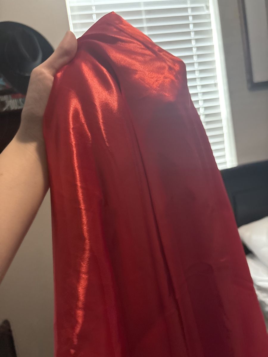 Two yards of red costume satin (a chunk missing)