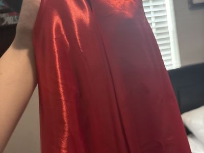 Two yards of red costume satin (a chunk missing)