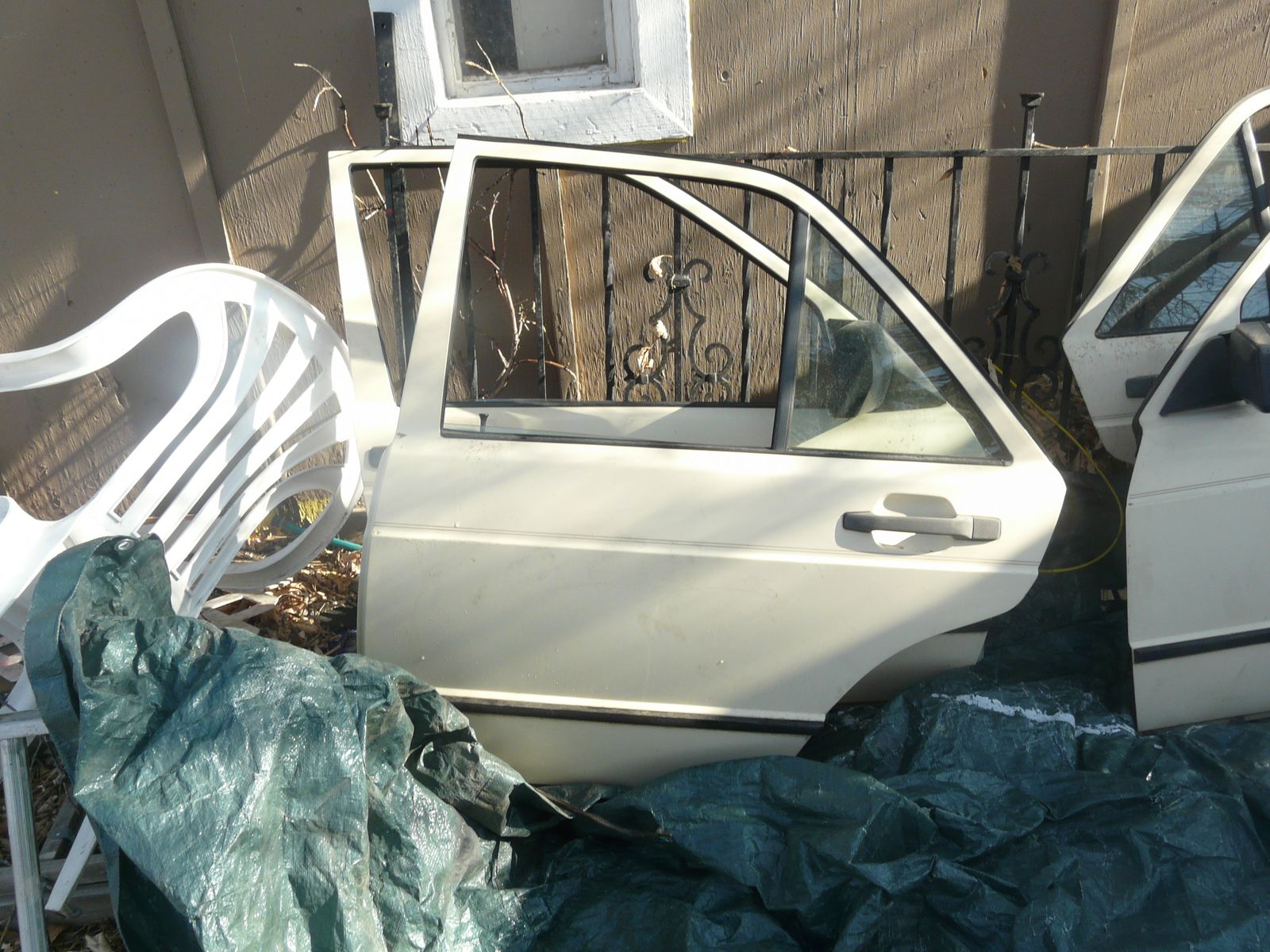SOME PARTS FROM WRECKED 1986 MERCEDES 190 4 DOOR SEDAN