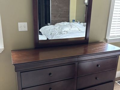 Dresser with mirror attachment