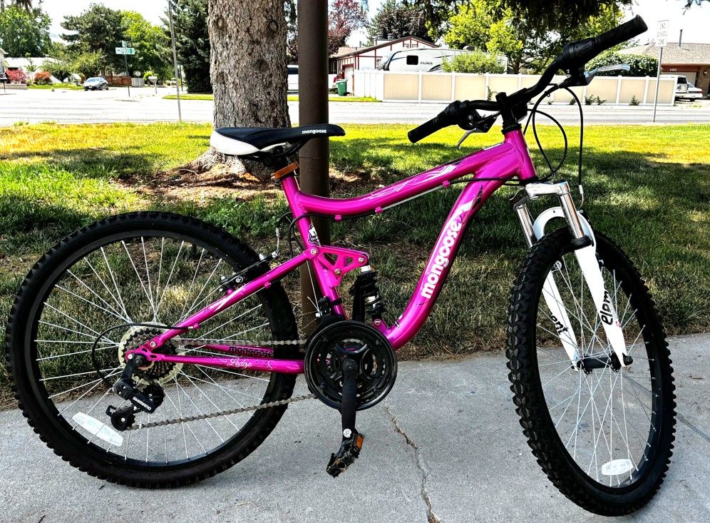 Mongoose Ledge 2.1 24” Girls Mountain Bike – 21 Speed, Full Suspension  Description
