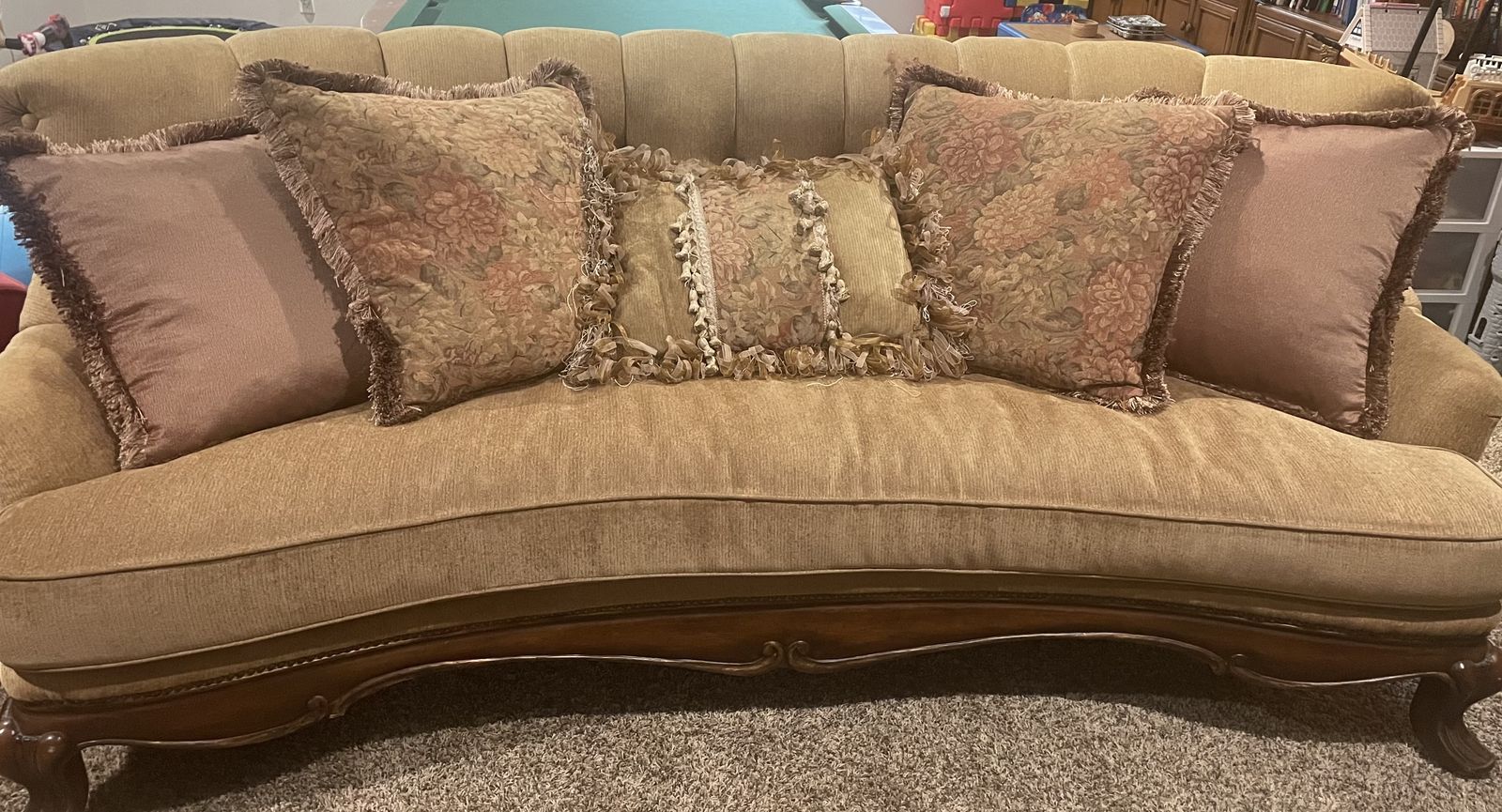 Vintage Curved Tufted Fabric Sofa with Carved Wood Trim and Matching Pillows
