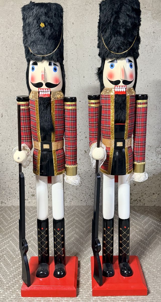 This Festive Pair of 5-Ft Tall Plaid Nutcracker Soldiers will delight both adults & children alike!