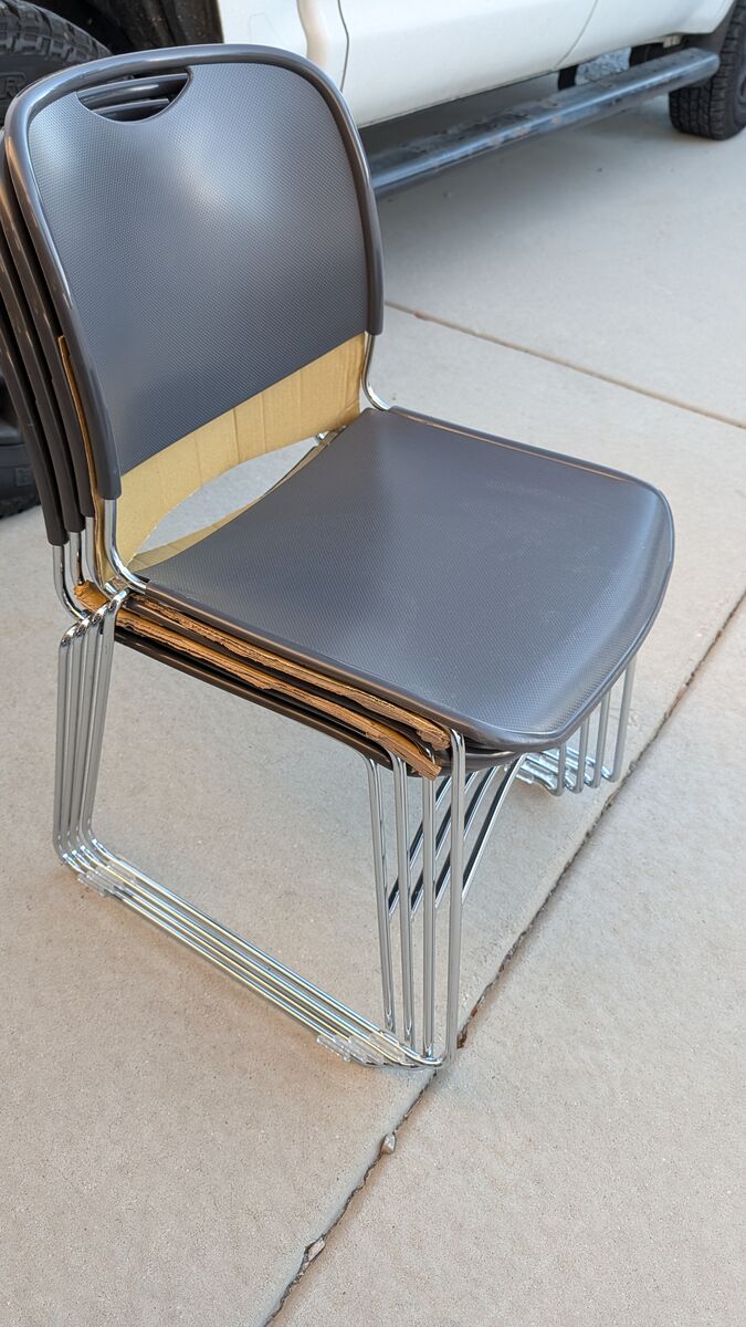 NEW (4-Pack) 8500 Series Gunmetal Ultra-Compact Plastic Stack Chair