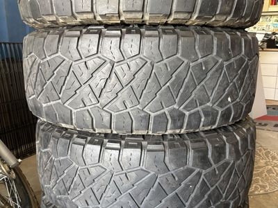 Nitto Ridge Grappler 37x12.50R20LT Tires with Black Rhino Wheels