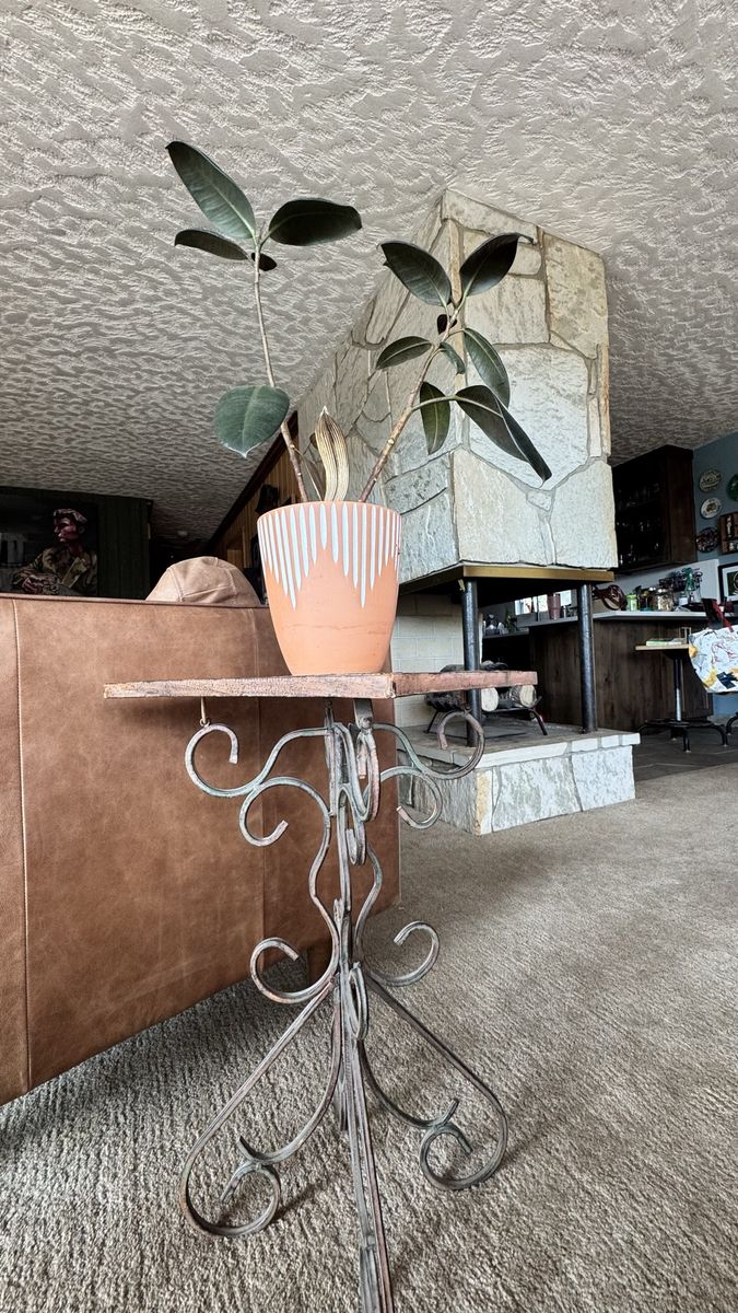 Copper Patina Metal Table 24” tall.    Leaf Design folds up