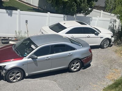 Two 2013 ford Taurus limited parts cars