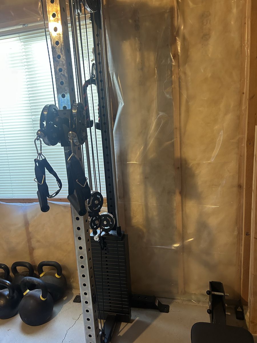 Home Gym Cable Machine Functional Trainer with Weight Stack and seal row pad.