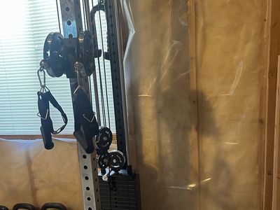 Home Gym Cable Machine Functional Trainer with Weight Stack and seal row pad.