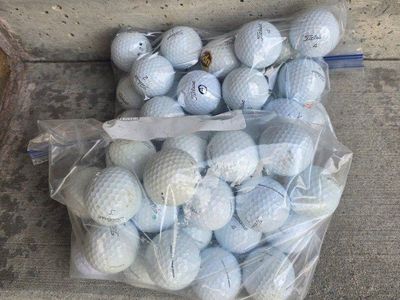 25 clean Titleist Pro V1 golf balls in great cond.