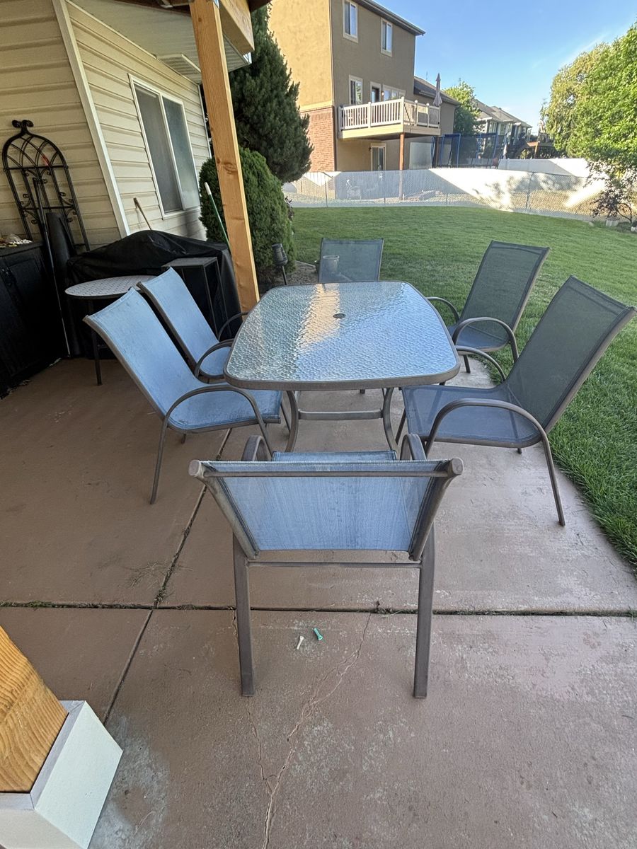 60x36 Inch, 6 Chair Glass and Metal Patio Table