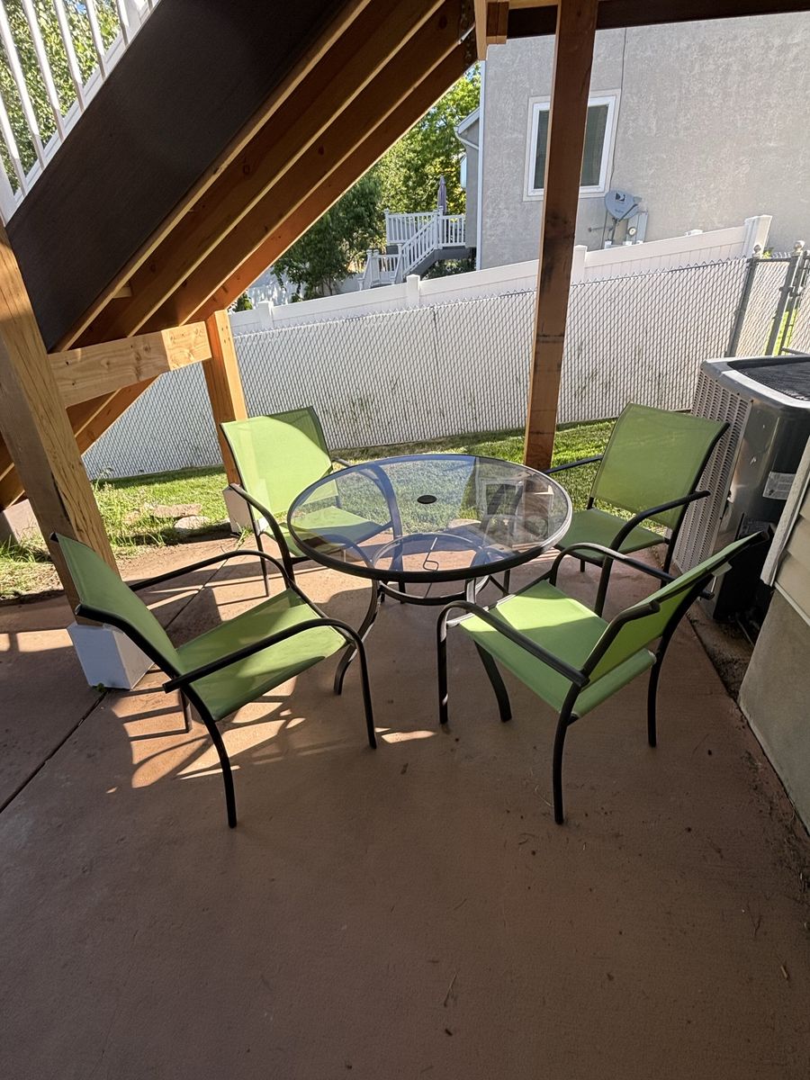 Round Glass Patio Table 4 Sling Chairs