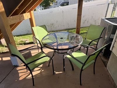 Round Glass Patio Table 4 Sling Chairs