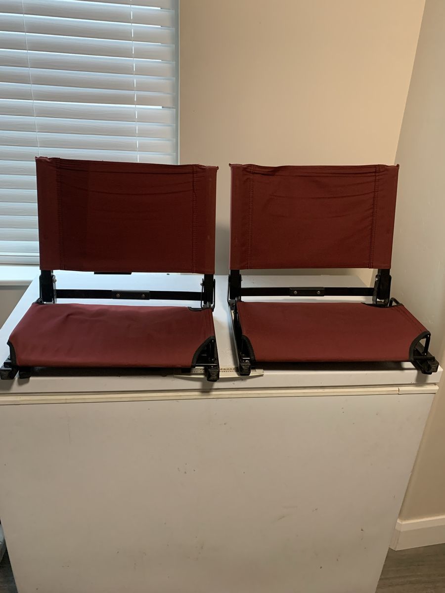 Two vintage stadium seats