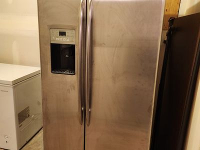 GE ProfileTM Counter-depth 24.6 Cu. Ft. Stainless Side-by-Side Refrigerator PSC25MSWASS