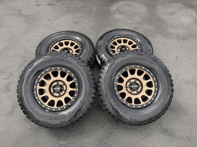 New 285/70r17 Mickey Thompson Baja Boss AT tires Bronze Method MR305 wheels 6x5.5 Toyota Tacoma Chevy Silverado 1500 GMC Sierra